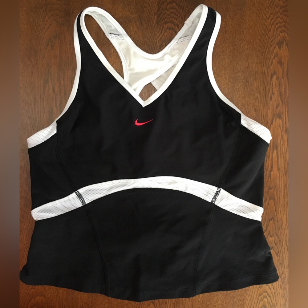 Nike Dri-Fit —Lg (12-14). 84nylon, 12spandex. Red swish/front.Phone pocket/back.